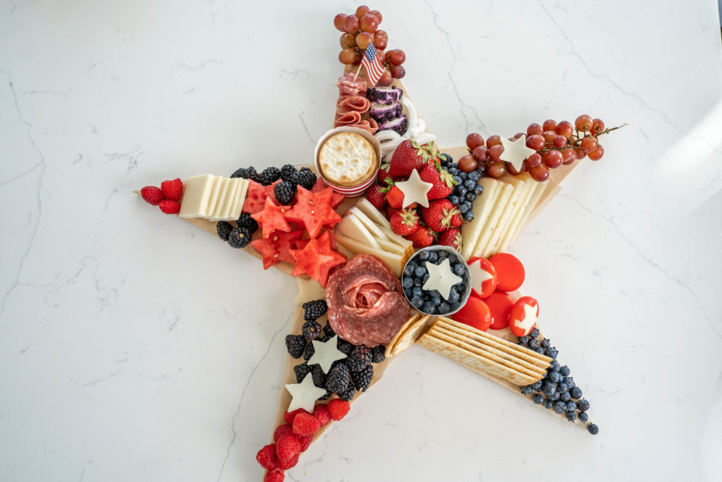 star shaped patriotic charcuterie board for 4th of july grazing boards