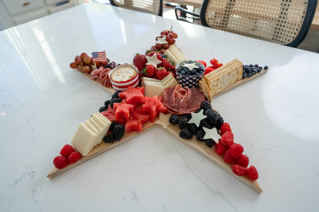 star shaped patriotic charcuterie board for 4th of july grazing boards