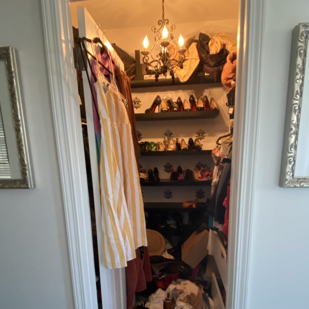 messy cluttered before picture of closet
