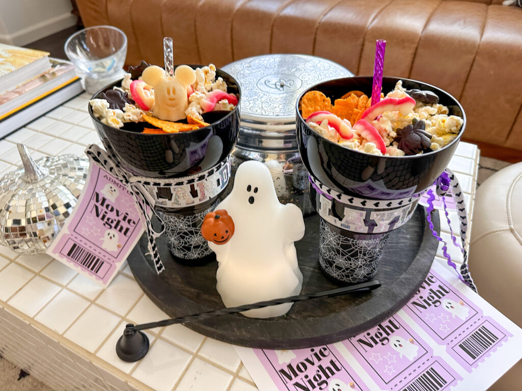Halloween Movie Night snack set up- stadium cup with snacks and printable movie tickets. Perfect for those cozy October nights in.
