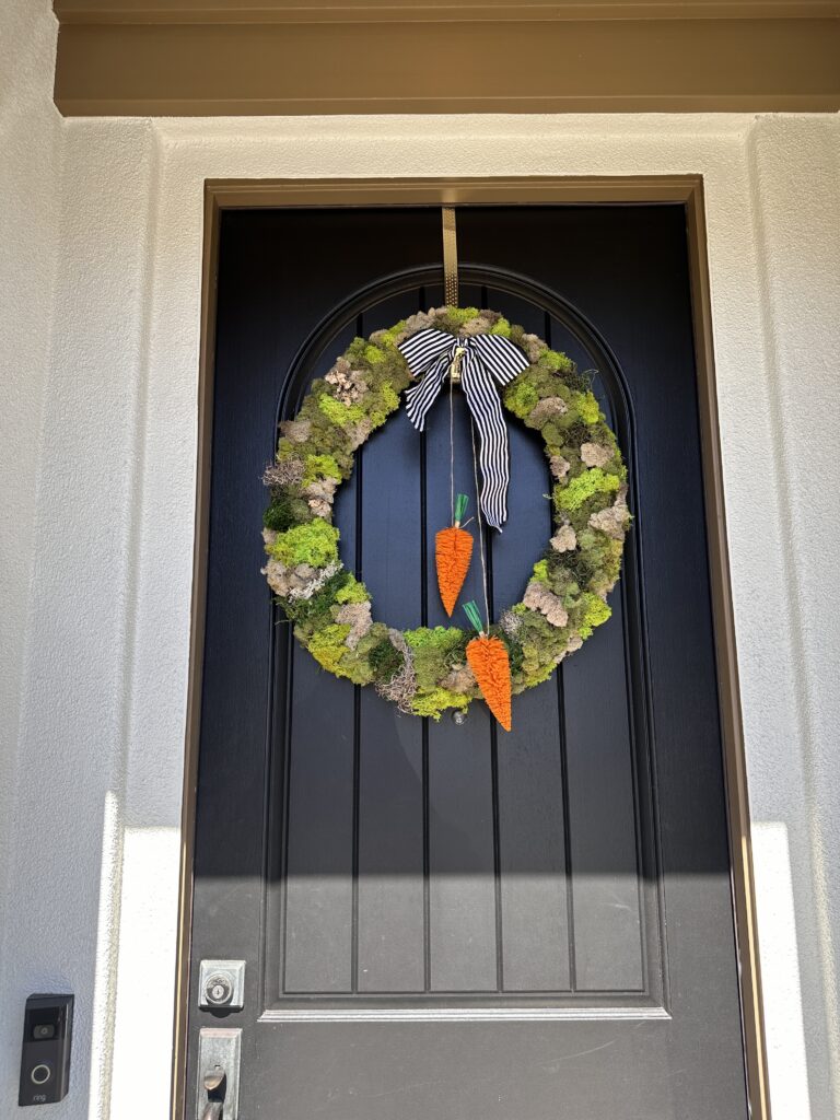 Antho inspired wreath using moss and grapevine. Anthropologie inspired wreath  for spring hanging on black front door. 