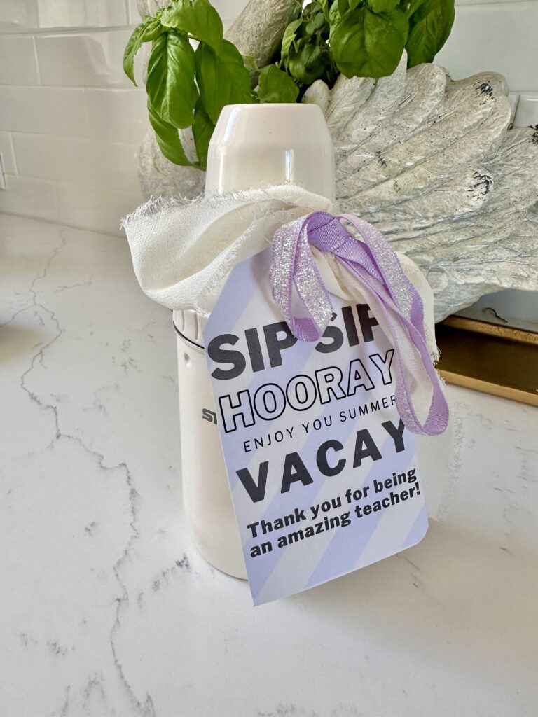 End of the school year gift idea for teachers. Stanley cocktail shake with tag that says Sip Sip Hooray enjoy your Summer Vacay. Thanks for being an amazing teacher. Tag is tied on with cream and lavender colored ribbons