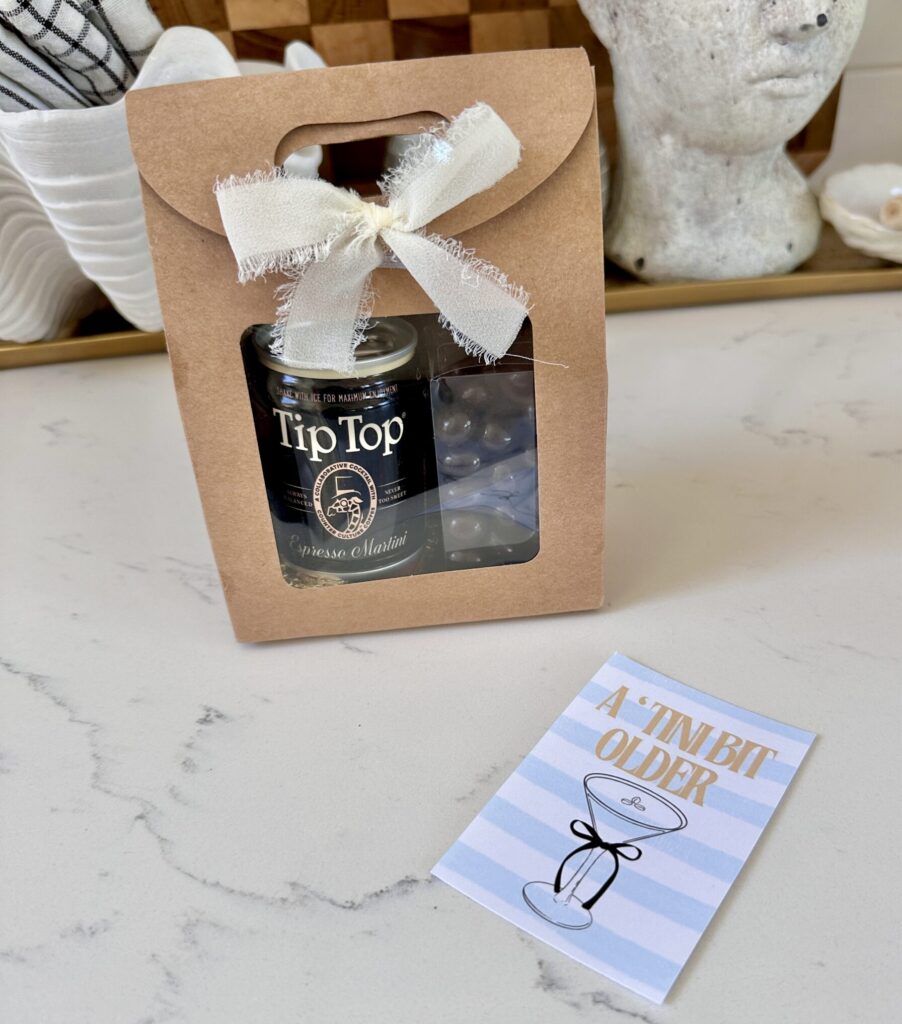 Espresso martini themed favor boxes for a tini bot older party with a printable tag that reads: A 'tini bit older